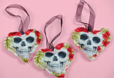 Skull Hanging Hearts